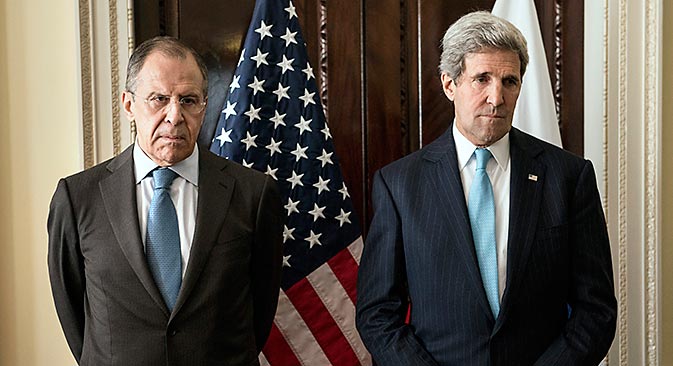 U.S. Secretary of State John Kerry (right) and Russia's Foreign Minister Sergei Lavrov before their meeting at Winfield House, in London, on March 14. Source: Reuters / Brendan Smialowski / pool