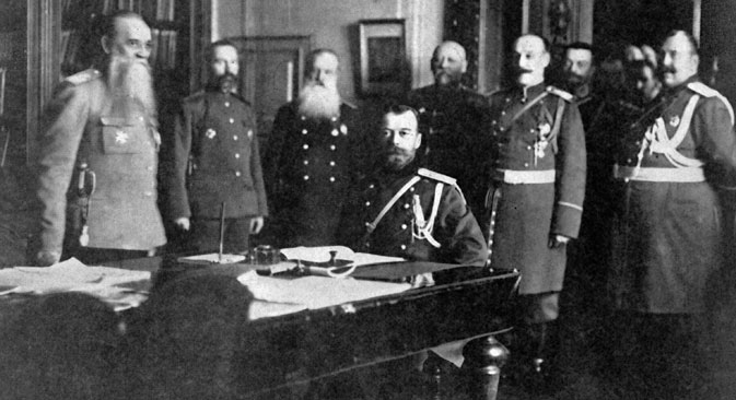 Emperor Nicholas II at a table with a group of Military Council members. Source: RIA Novosti