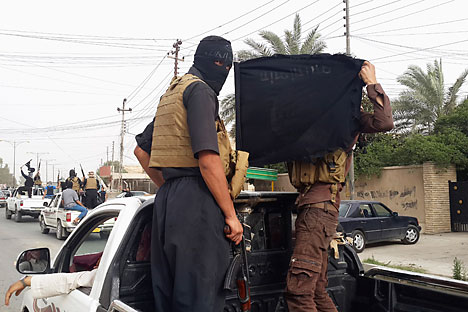 Militan ISIS di kota Mosul, Irak, pada 12 Juni 2014.