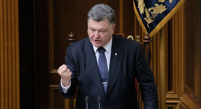 Ukrainian President Petro Poroshenko gestures as he speaks to lawmakers during a parliament session in Kiev, July 16, 2015. Source: AP
