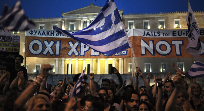Supporters of the "NO" option for July 5 referendum demonstrate in central Syntagma Square in front of the Greek parliament building in Athens, Greece, June 29, 2015.. Source: EPA / Fotis Plegas G