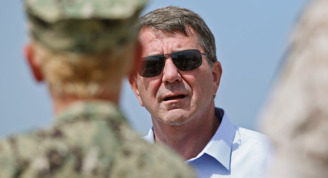 Secretary of Defense Ashton Carter is briefed about a Marine exercise by Marine Major Quint Harris at Red Beach Thursday, Aug. 27, 2015, at Camp Pendleton, Calif. Source: AP