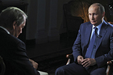 Владимир Путин и американския журналист Чарли Роуз.