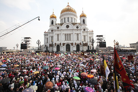 Orthodox celebration gathers crowds of people around the country's main church - Moscow's Cathedral of Christ the Savior.