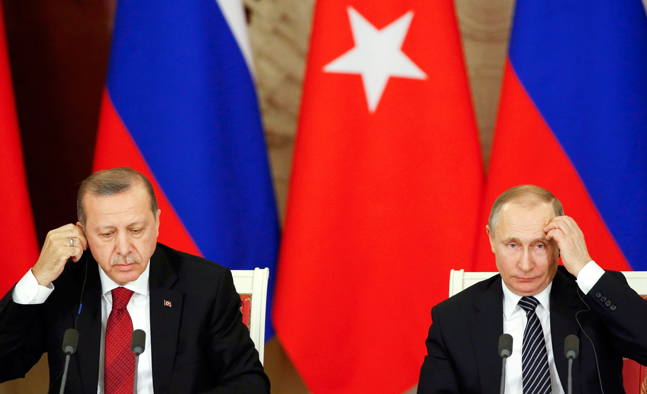 Presiden Turki Recep Tayyip Erdoğan (kiri) dan Presiden Rusia Vladimir Putin.