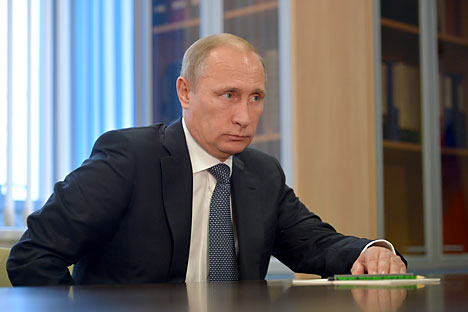 Vladimir Putin: Semua pihak harus sadar bahwa ekonomi dan keuangan dunia saat ini sangat bergantung satu sama lain. Foto: Alexey Druzhinin/TASS
