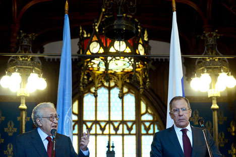 Russian Foreign Minister Sergey Lavrov, right, and envoy Lakhdar Brahimi face reporters after talks Monday in Moscow. Source: AFP/ East News
