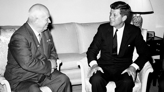 Soviet Premier Nikita Khrushchev and President John F. Kennedy talk in the residence of the US ambassador in a suburb of Vienna, June 3, 1961. Source: AP