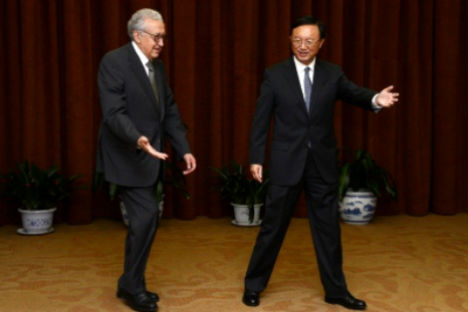 Lakhdar Brahimi with Chinese Foreign Minister Yang Jiechi in Beijing. Source: Press Photo