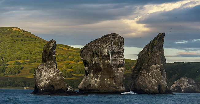"Tri Brata" (Three Brothers) – a major landmark in the Avacha bay of Kamchatka. Source: Ivan Dementievskiy