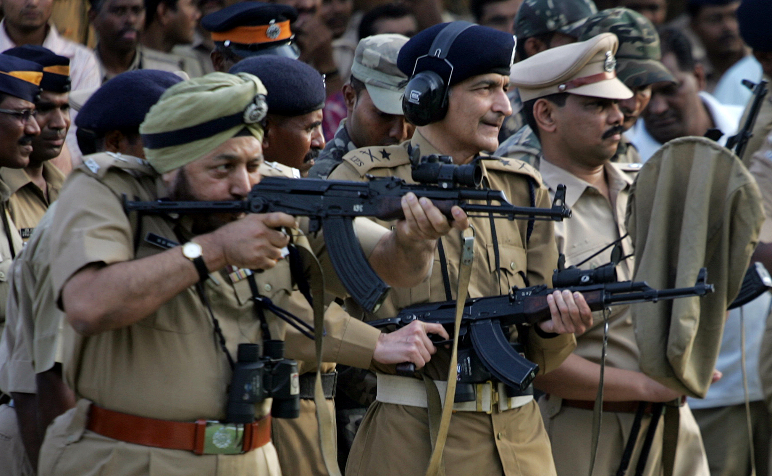 Top officers from the Mumbai Police fix aim at a stationary target with an AK-47 rifle at the SRP Rifle Range in Jogeshwari, Mumbai in 2009. Source: Getty Images