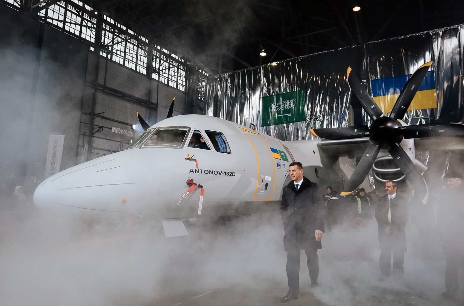 Guests attend the presentation of the new AN-132D aircraft demonstrator in the final assembly shop of the Antonov aircraft plant in Kiev, 20 December 2016. Source: Vostock-Photo
