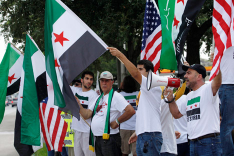Proteste a Houston contro l'intervento americano in Siria, il 31 agosto 2013 (Foto: AP)