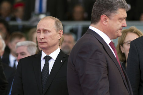 L’incontro tra Putin e il neoletto presidente ucraino Petro Poroshenko è servito ad assumere l’impegno di una ricerca per la soluzione della crisi (Foto: Ria Novosti)