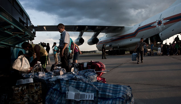 L'arrivo di alcuni rifugiati (Foto: AFP/East News)
