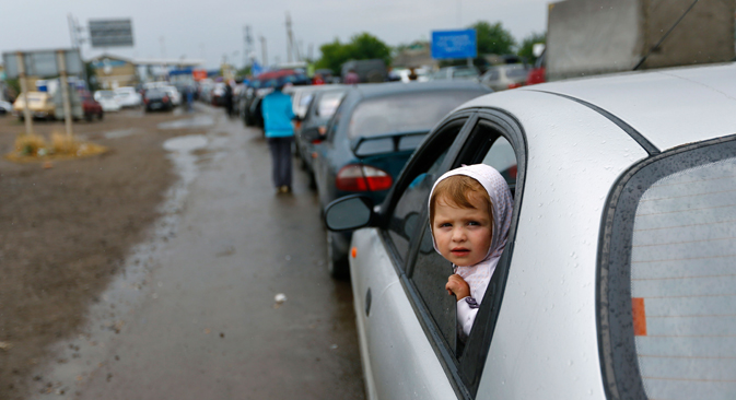 Rifugiati in fuga dalle zone degli scontri (Foto: Reuters)