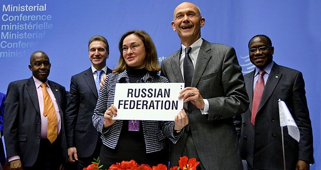 Преговорите околу влезот на Русија во Светската трговска организација траеја повеќе од 15 години. Протоколот за влез е потпишан на 16 декември 2011 во Женева. Извор: AFP/EastNews.