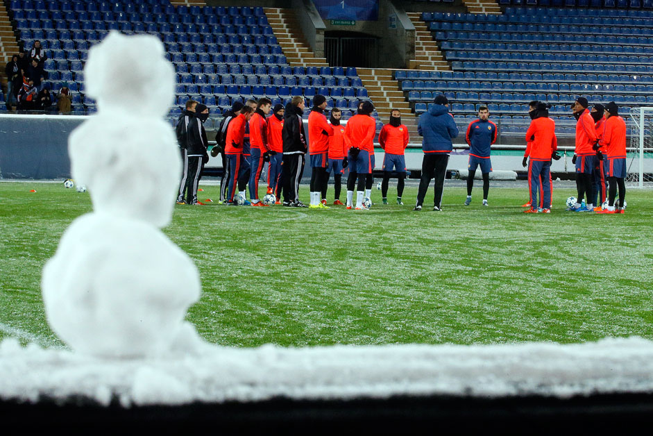 A snowman is made on the side of the pitch as Valencia players attend a training session in St. Petersburg, Russia, Monday, Nov. 23, 2015, ahead of the Champions League, group H, soccer match, between Valencia and Zenit St. Petersburg on Tuesday.