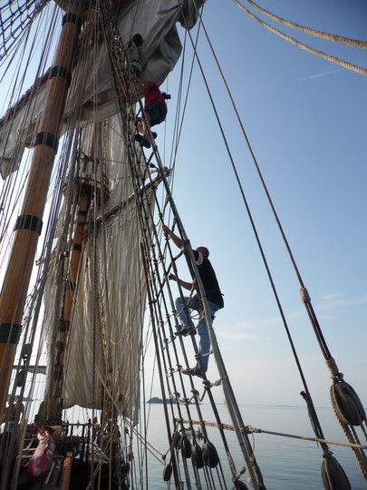 tall ships in battle reenactment